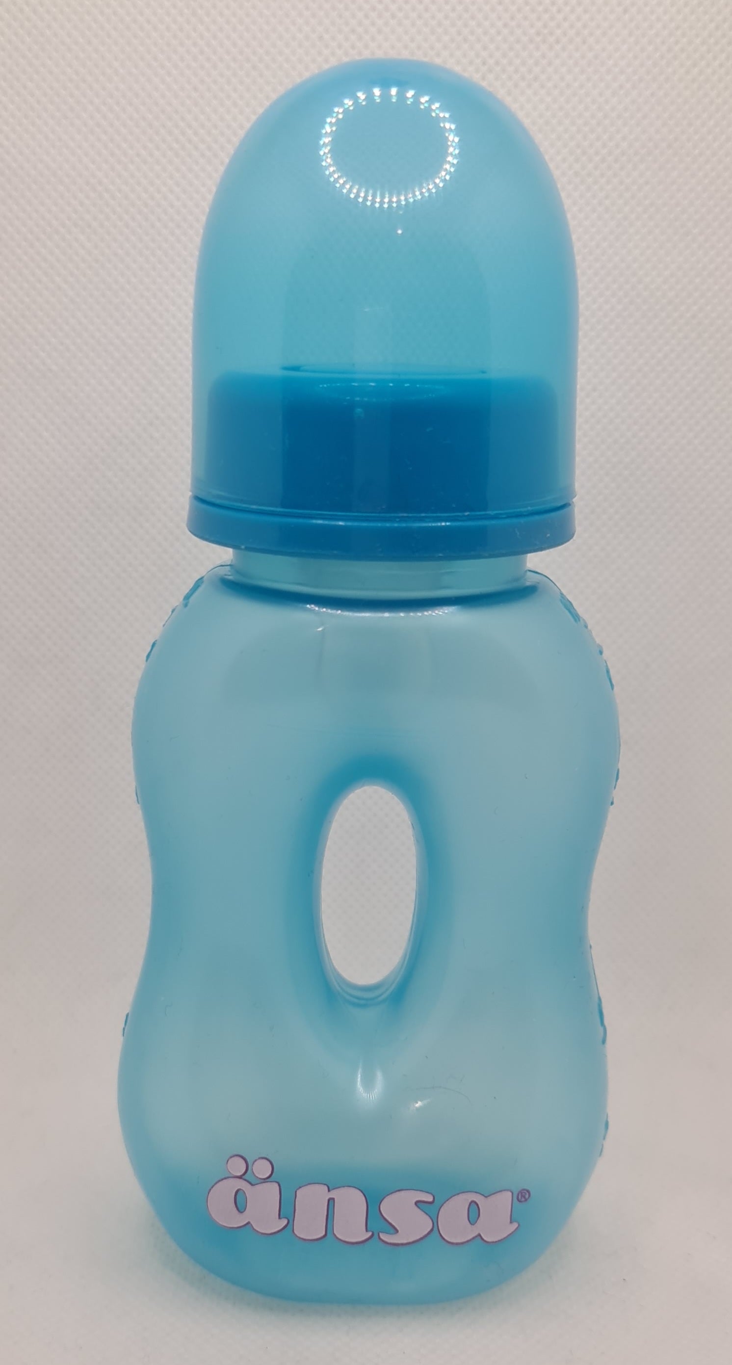 a blue plastic bottle with a blue cap