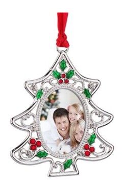 a silver christmas ornament with a picture of a family