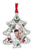 a silver christmas ornament with a picture of a family