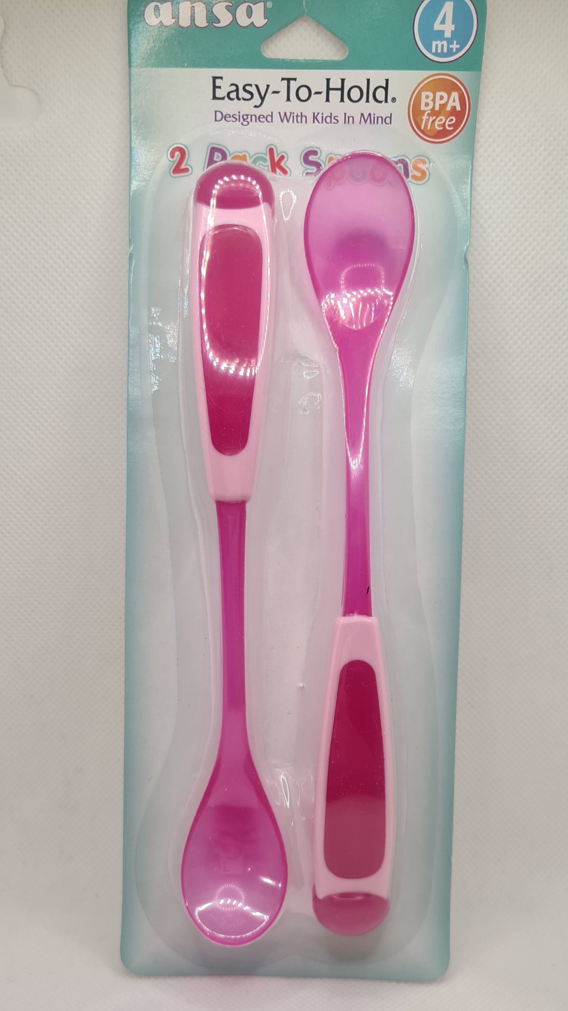 a pink spoons in a package