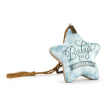 a blue star shaped christmas ornament