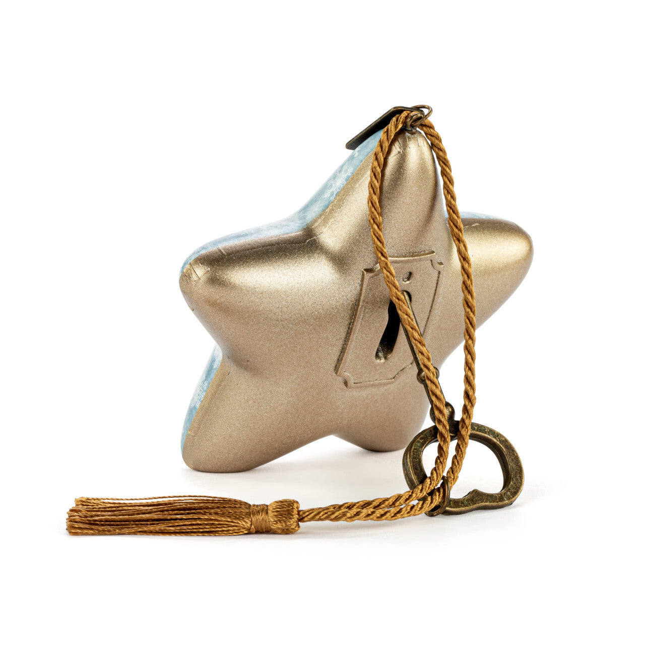 a gold star shaped object with a key and a tassel