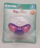 a purple pacifier in a package