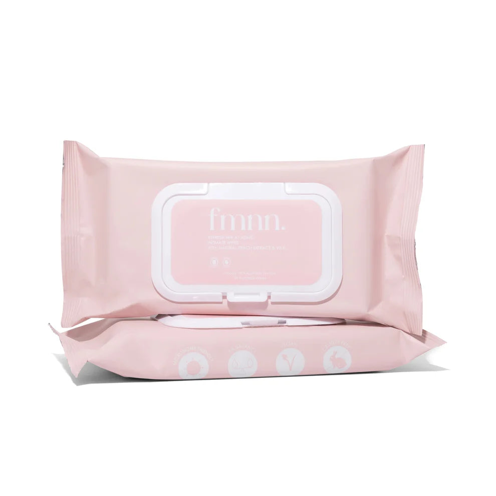 a pink wet wipes on a white background