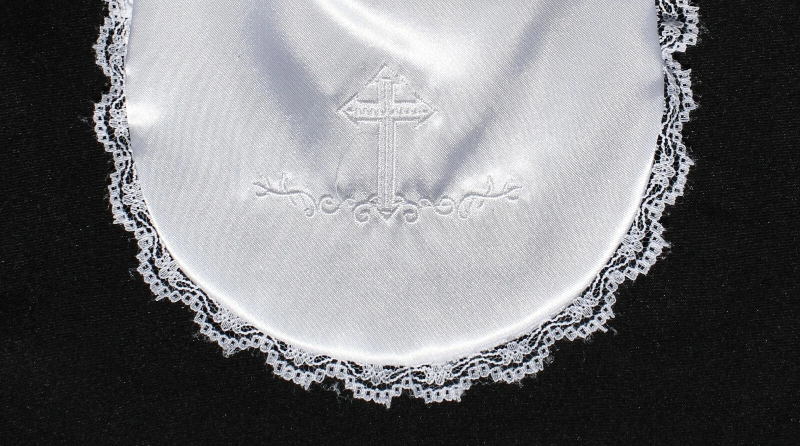 a white cloth with a cross on it