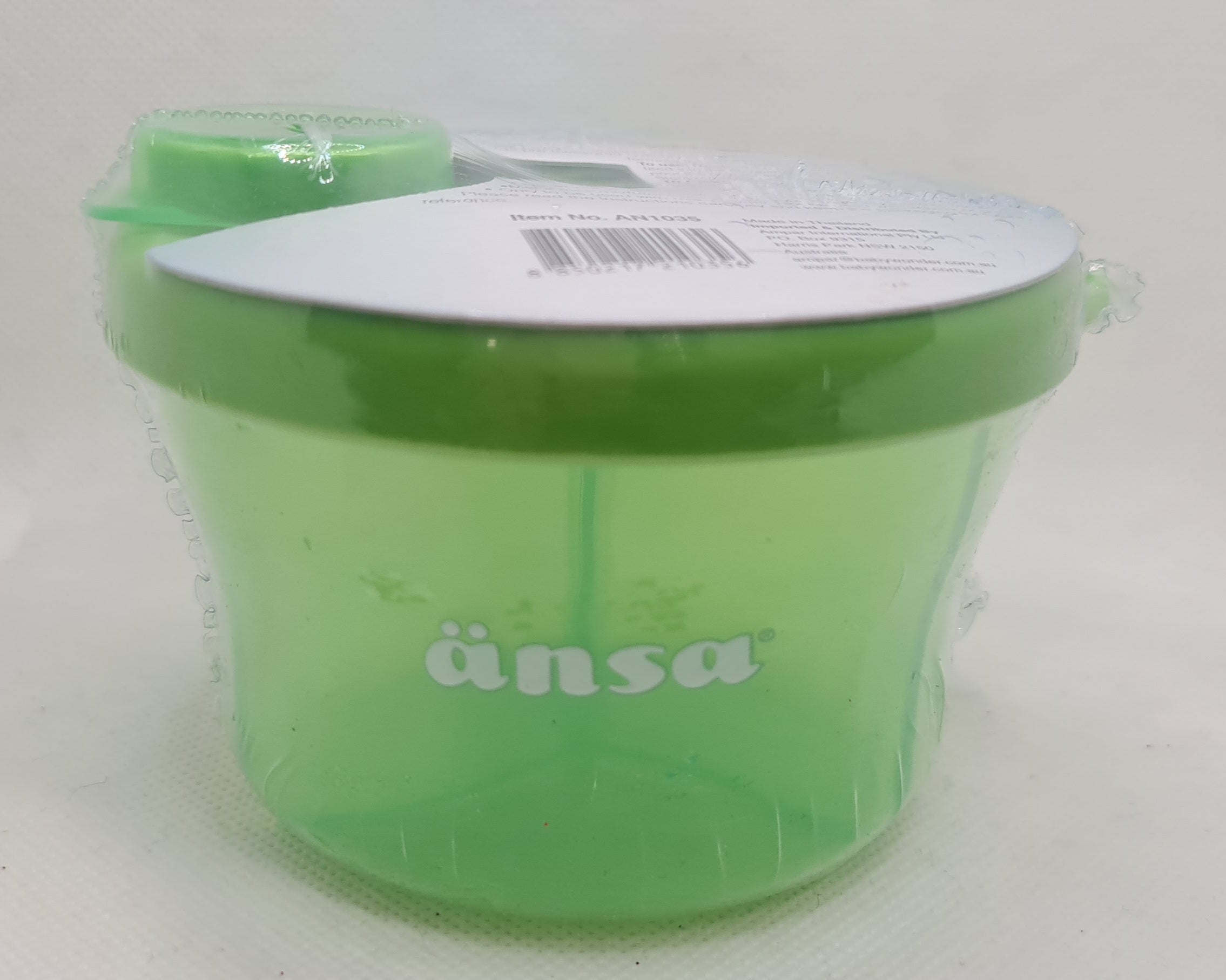 a green container with a lid